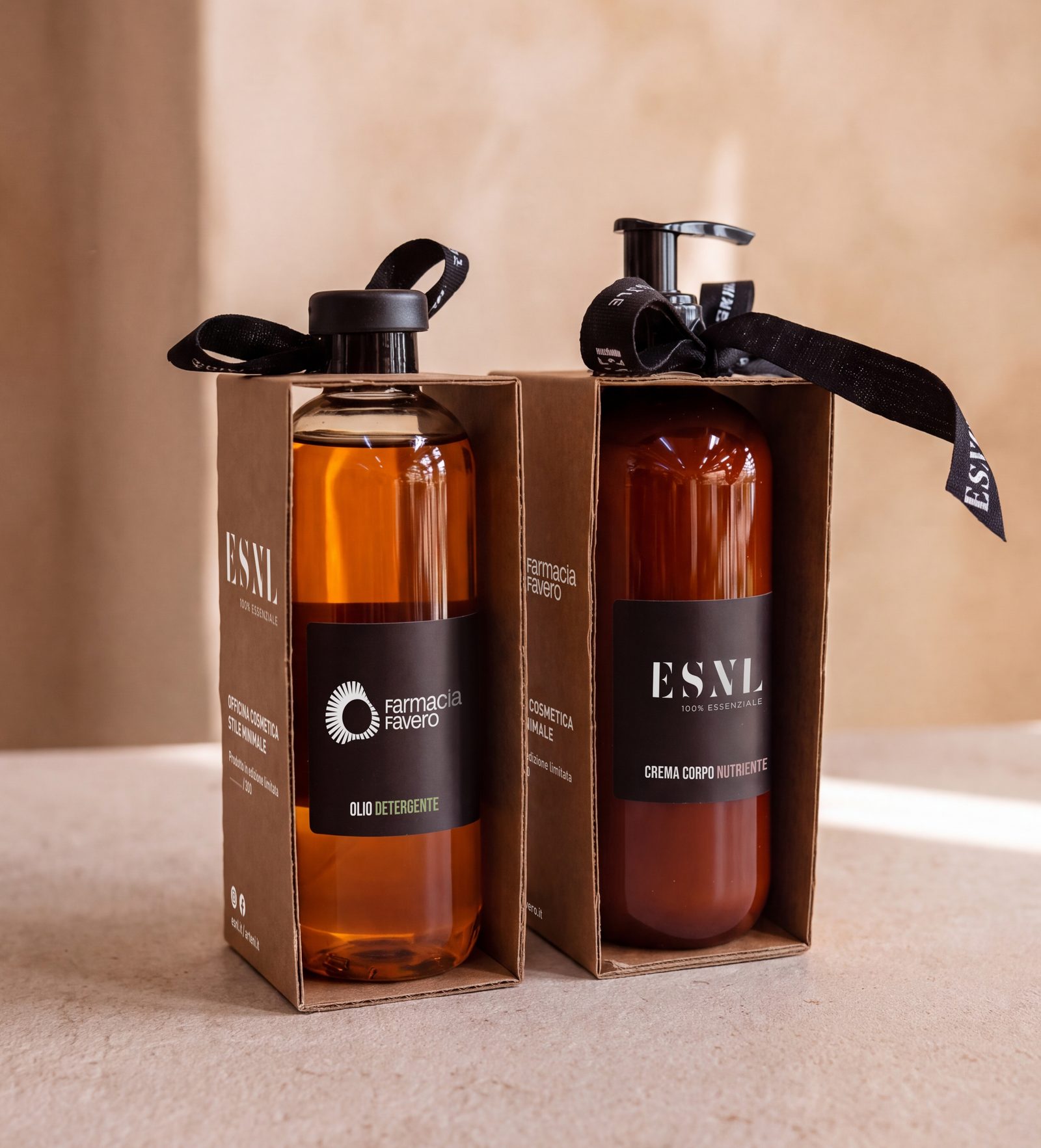 Olio detergente e crema corpo nutriente ESNL × Farmacia Favero nel packaging in cartone